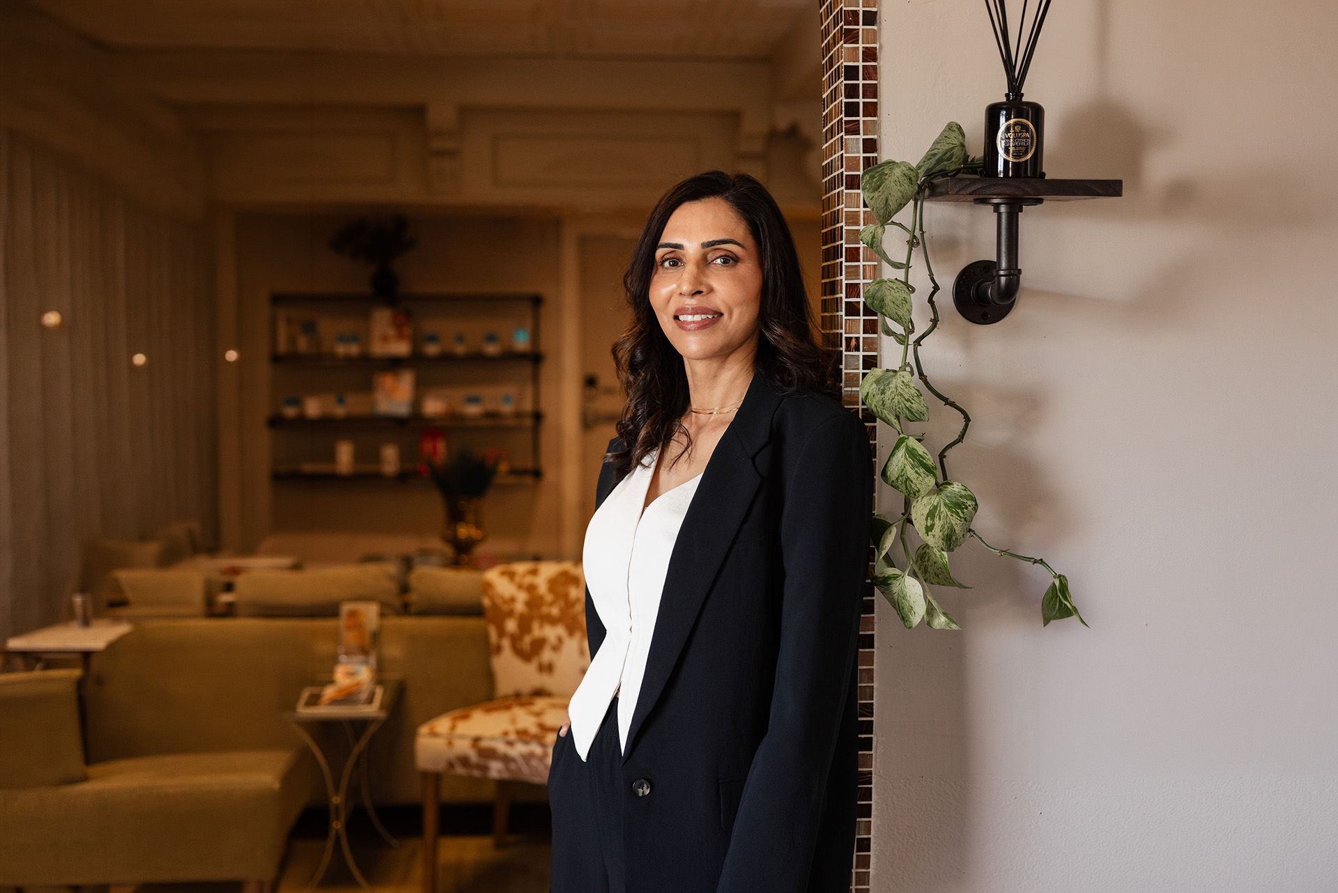 Younger You Aesthetics — owner Su Mann in the spa lobby