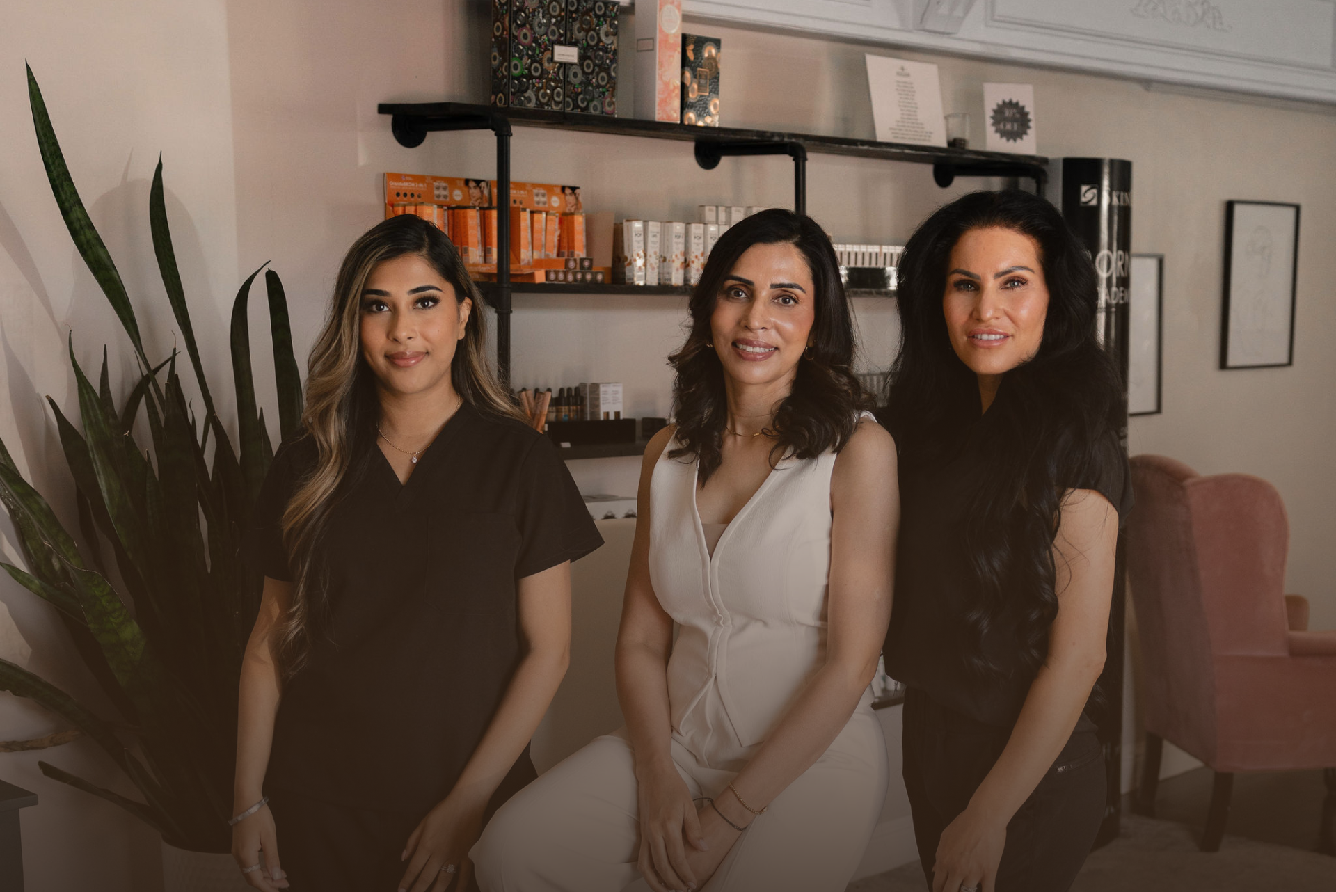 The Younger You Aesthetics team — three providers in the spa interior